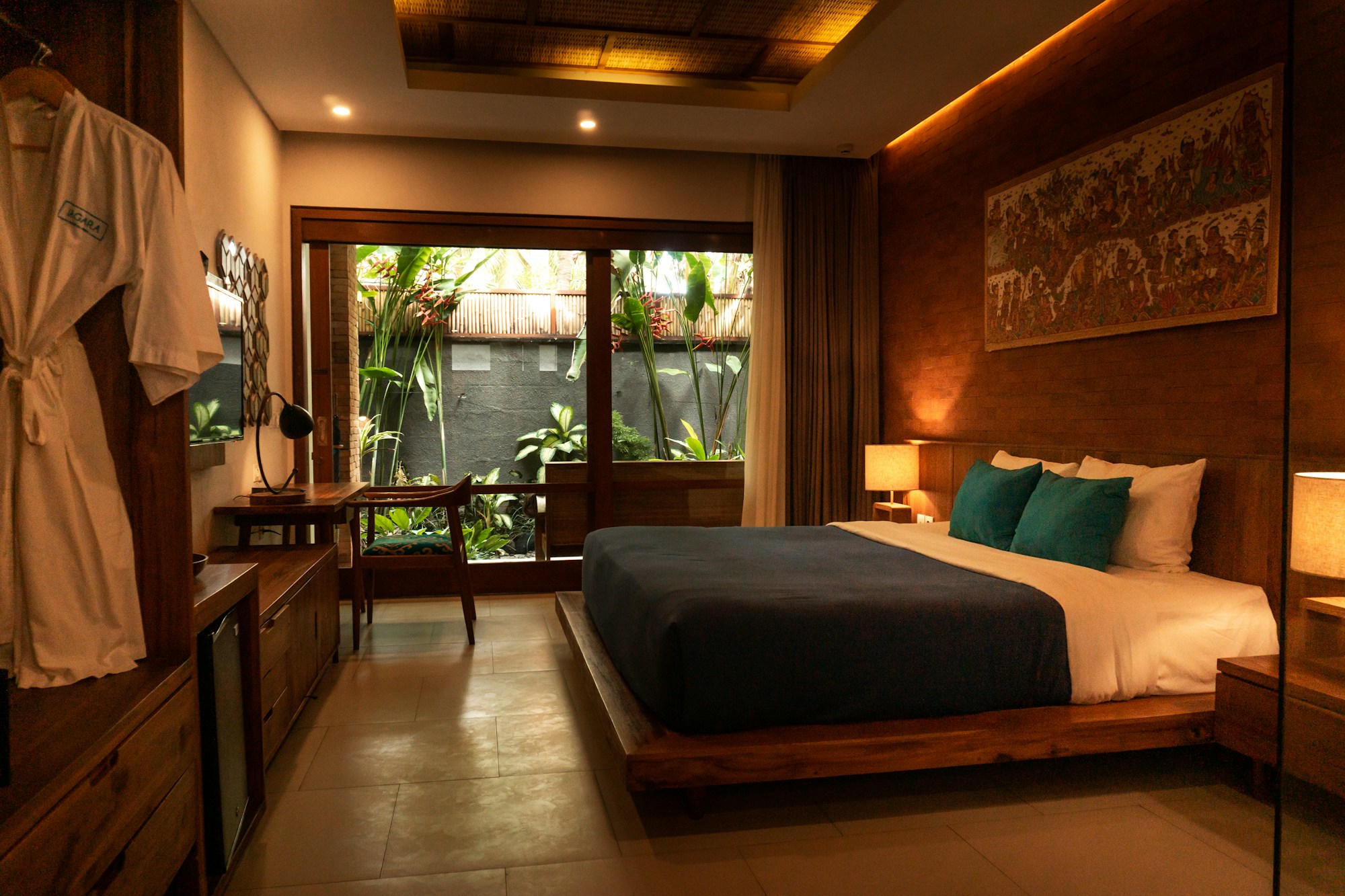 A warm luxury suite overlooking a lush private garden
